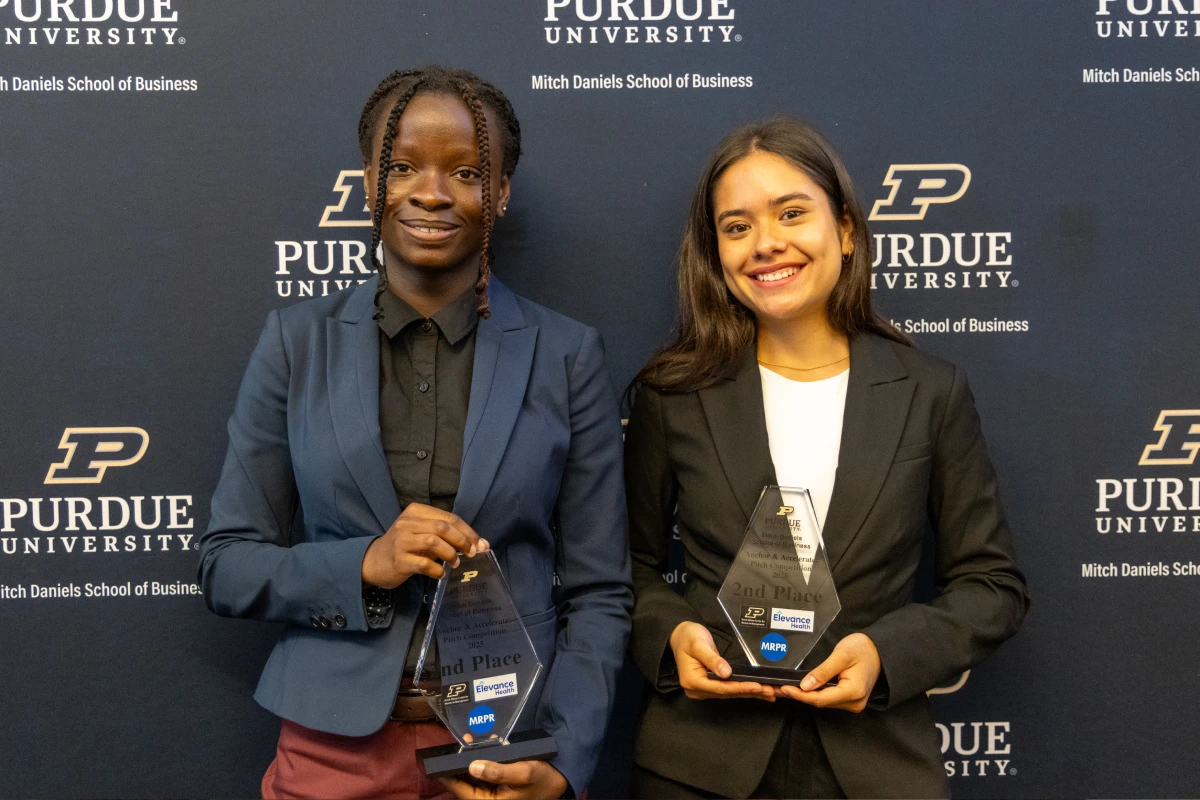 Students holding awards