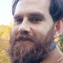 Headshot of James Mollison