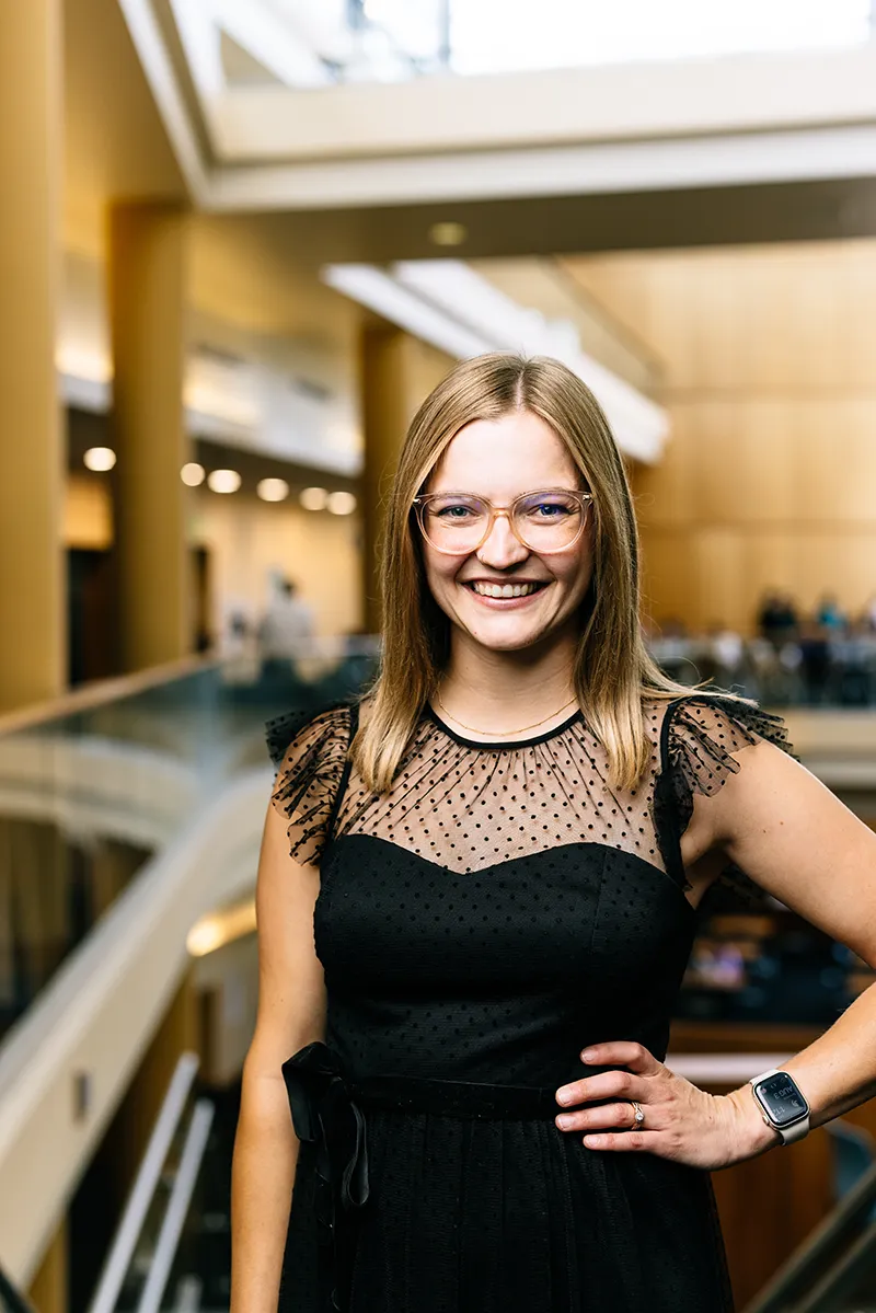 Online student visiting campus for graduation