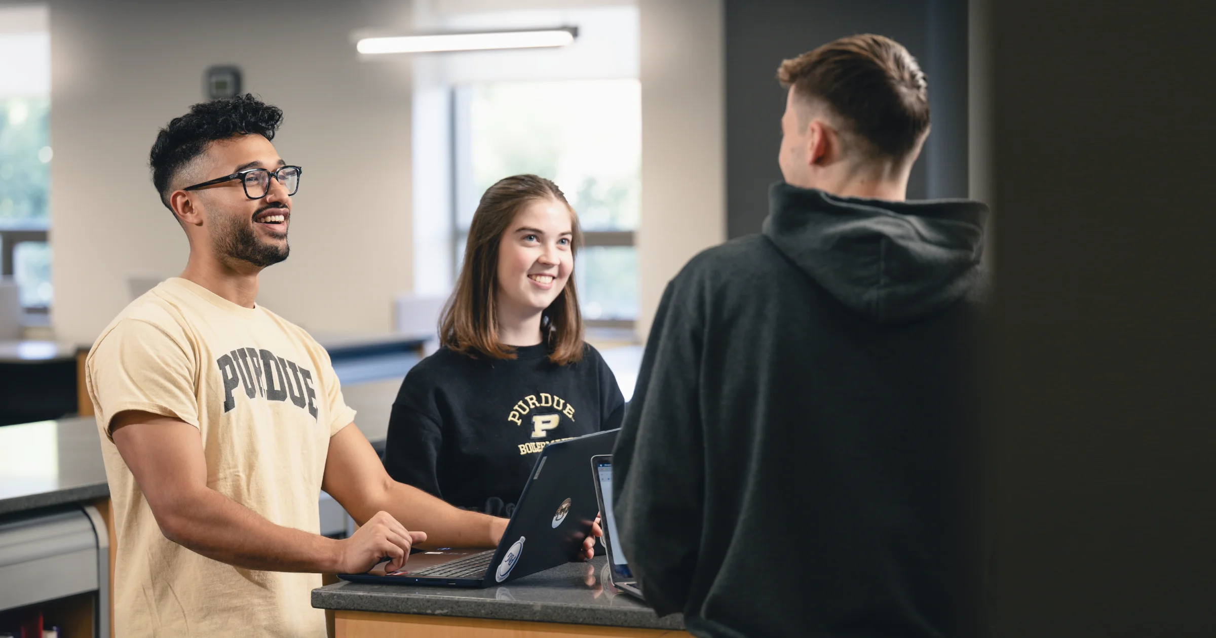 Three Daniels School students in conversation