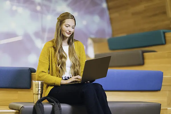 Purdue University, student works at HighAlpha coworking space downtown