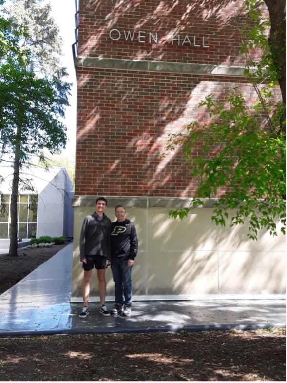 Mitchell with his mom in front of owen hall 