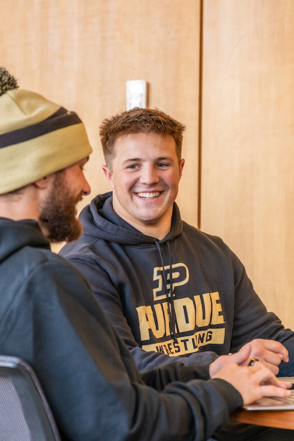 Filipovich in conversation with a classmate