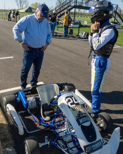 Athreya discussing race performance with Steve Dunlop