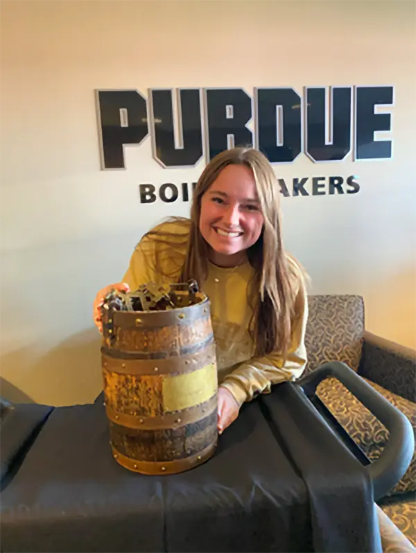 Alisha with The Old Oaken Bucket inside Ross-Ade Stadium