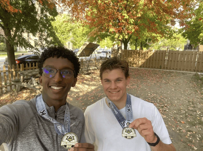 My friend Josh and I right after completing the Fall 2025 Purdue 5K/half-marathon.