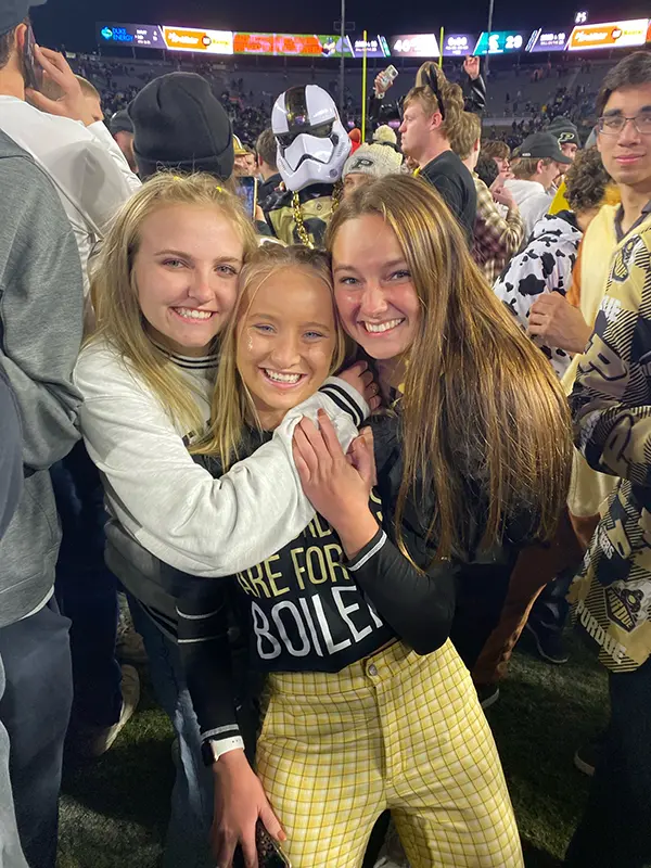 Alisha (right) with friends at Ross-Ade Stadium