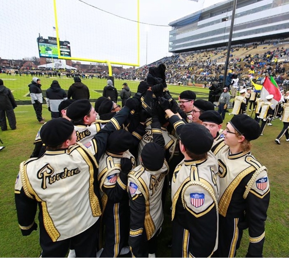 Marching band team huddle